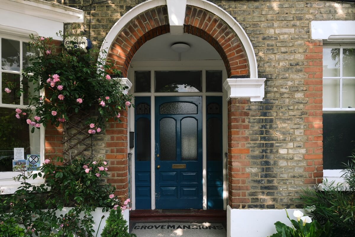 entry-arched-doorway-blue-front-door-nordroom
