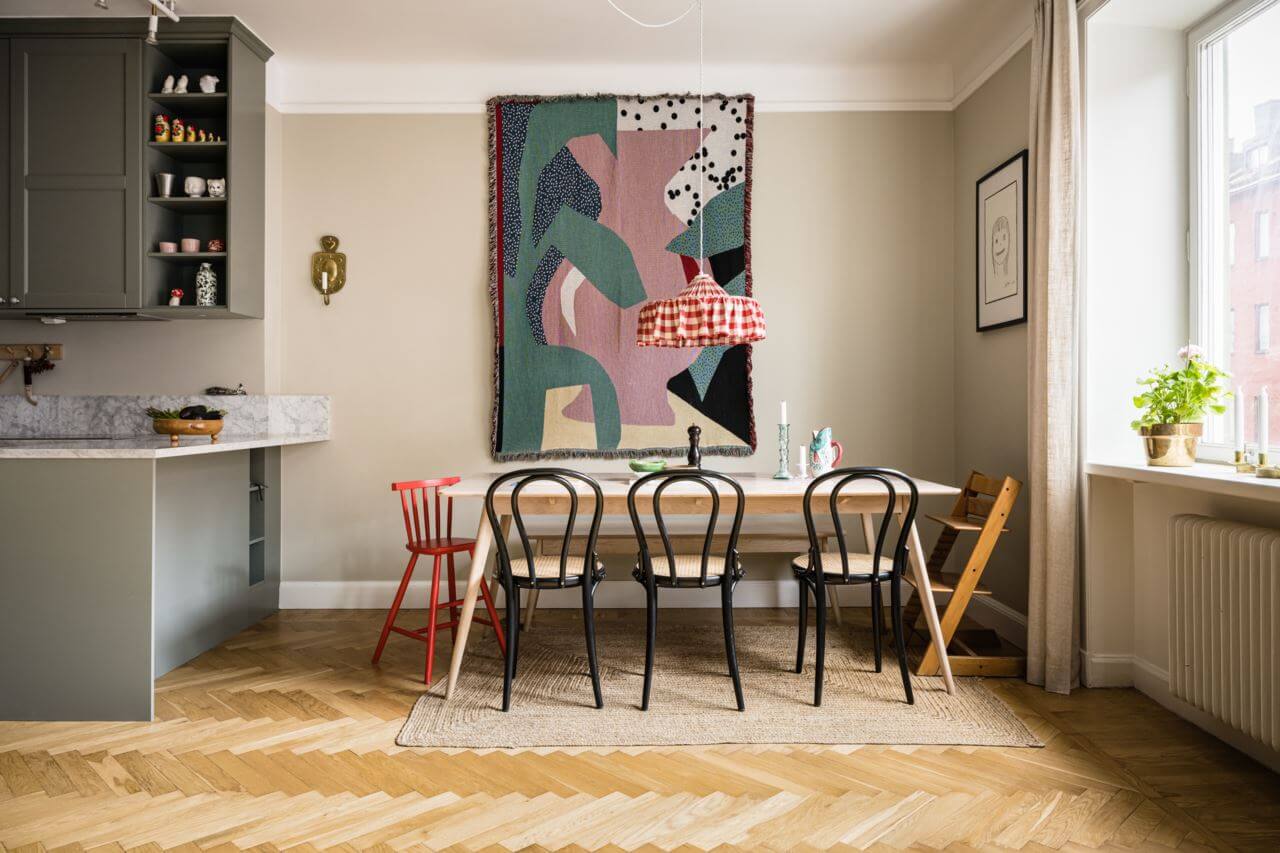 kitchen-dining-table-large-artwork-wooden-floor-nordroom
