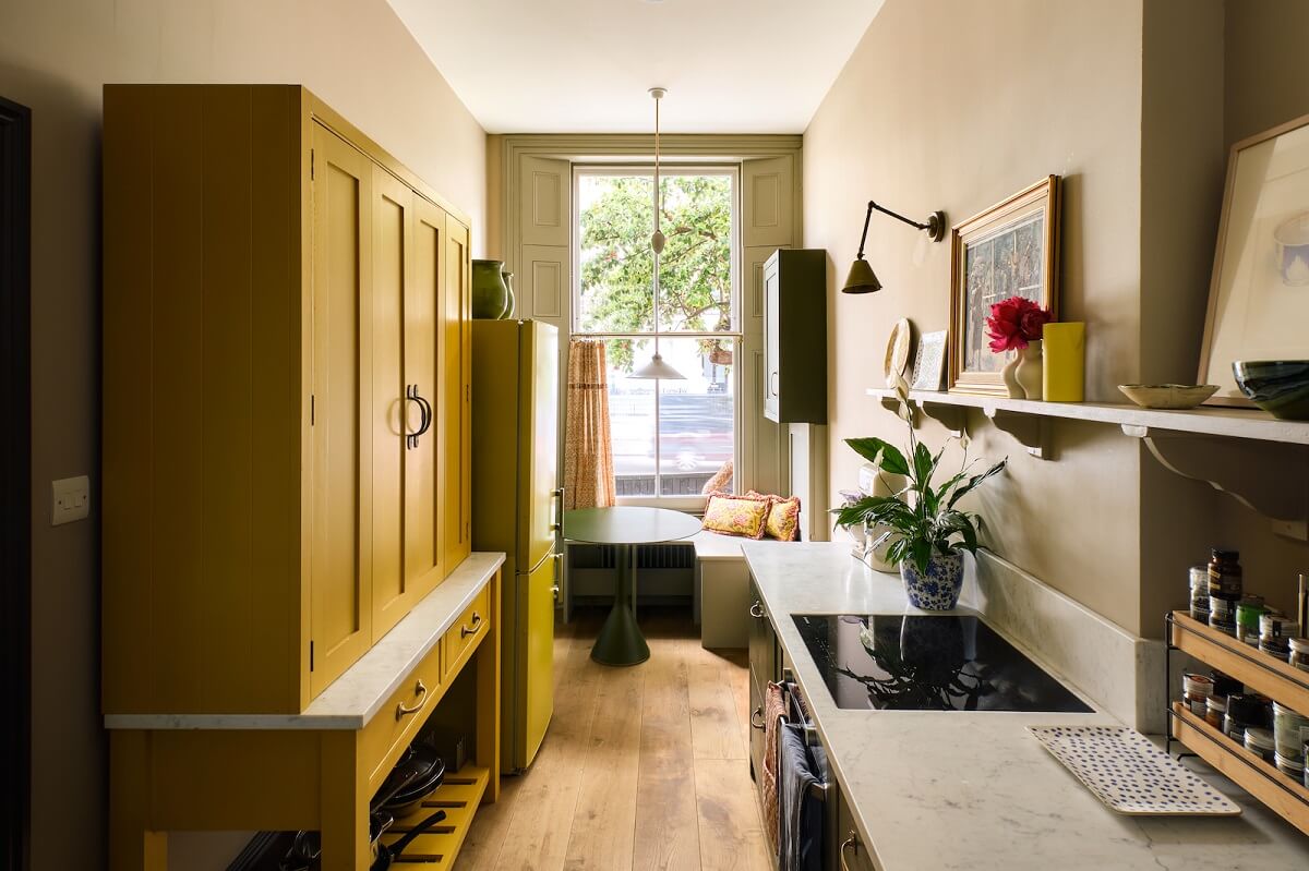 kitchen-window-seat-yellow-cabinet-nordroom