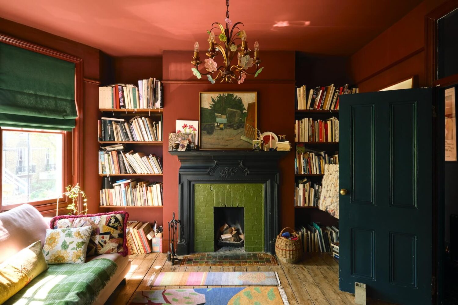 living-room-deep-reddish-brown-farrow-ball-walls-green-firpelace-bookshelves-nordroom