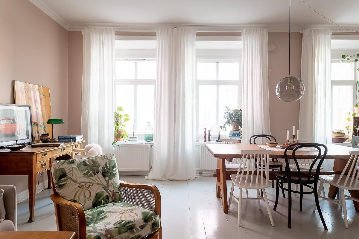 living-room-pink-walls-white-painted-floorboards-nordroom