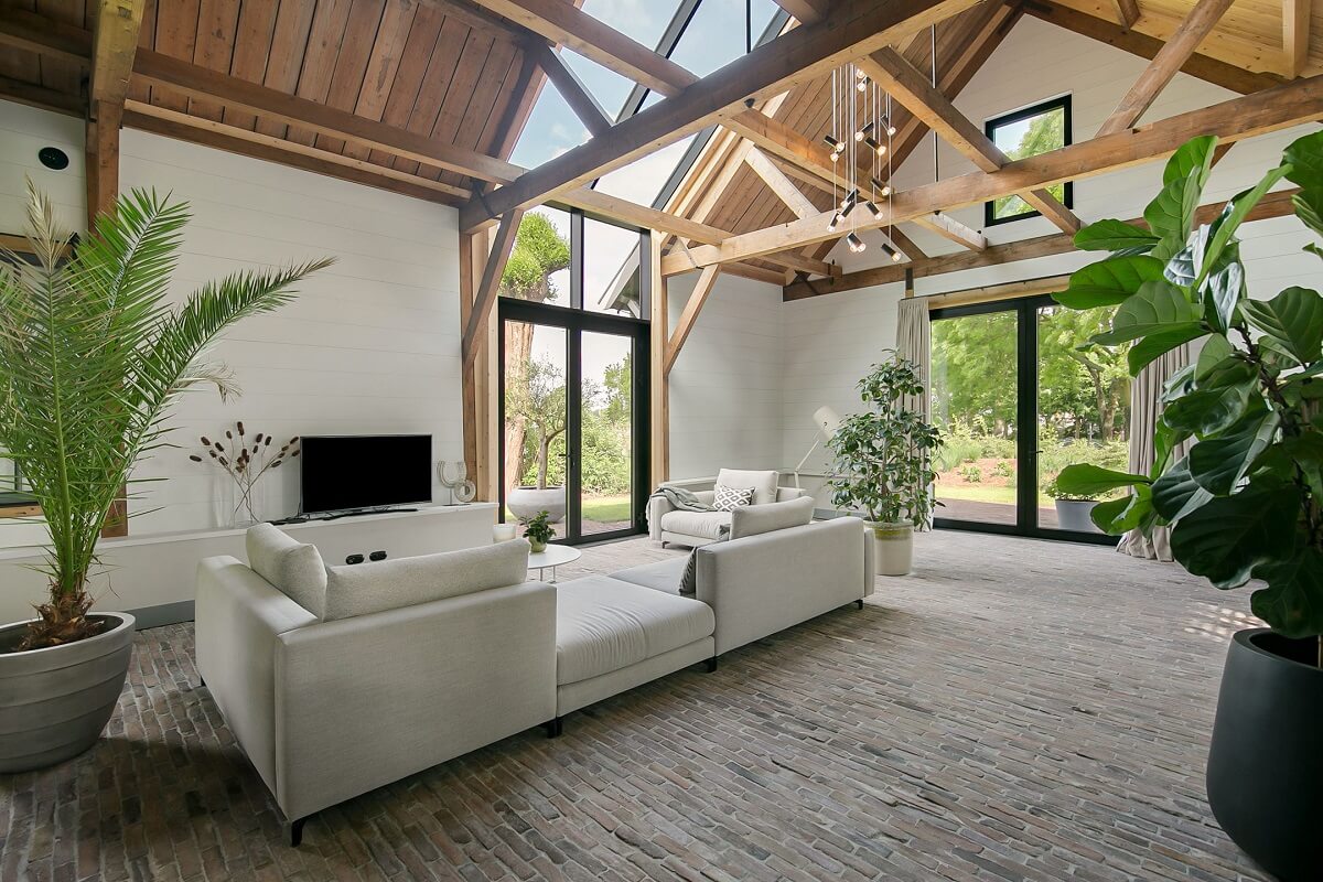 living-room-white-sofa-wooden-ceiling-skylight-nordroom