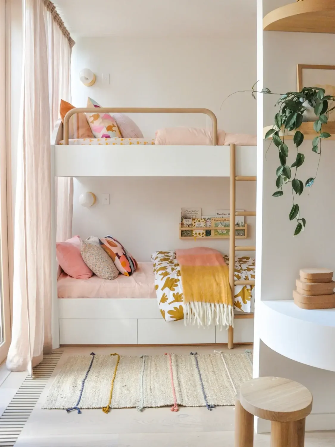 modern-adult-bunk-beds-pastel-colored-bedding-nordroom