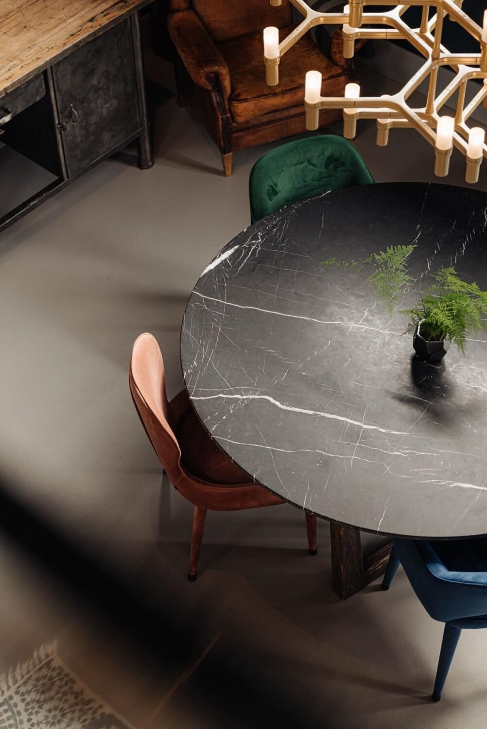 round-marble-dining-table-industrial-loft-nordroom