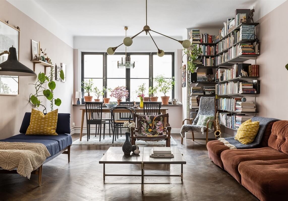 warm-living-room-herringbone-floor-bookshelves-nordroom