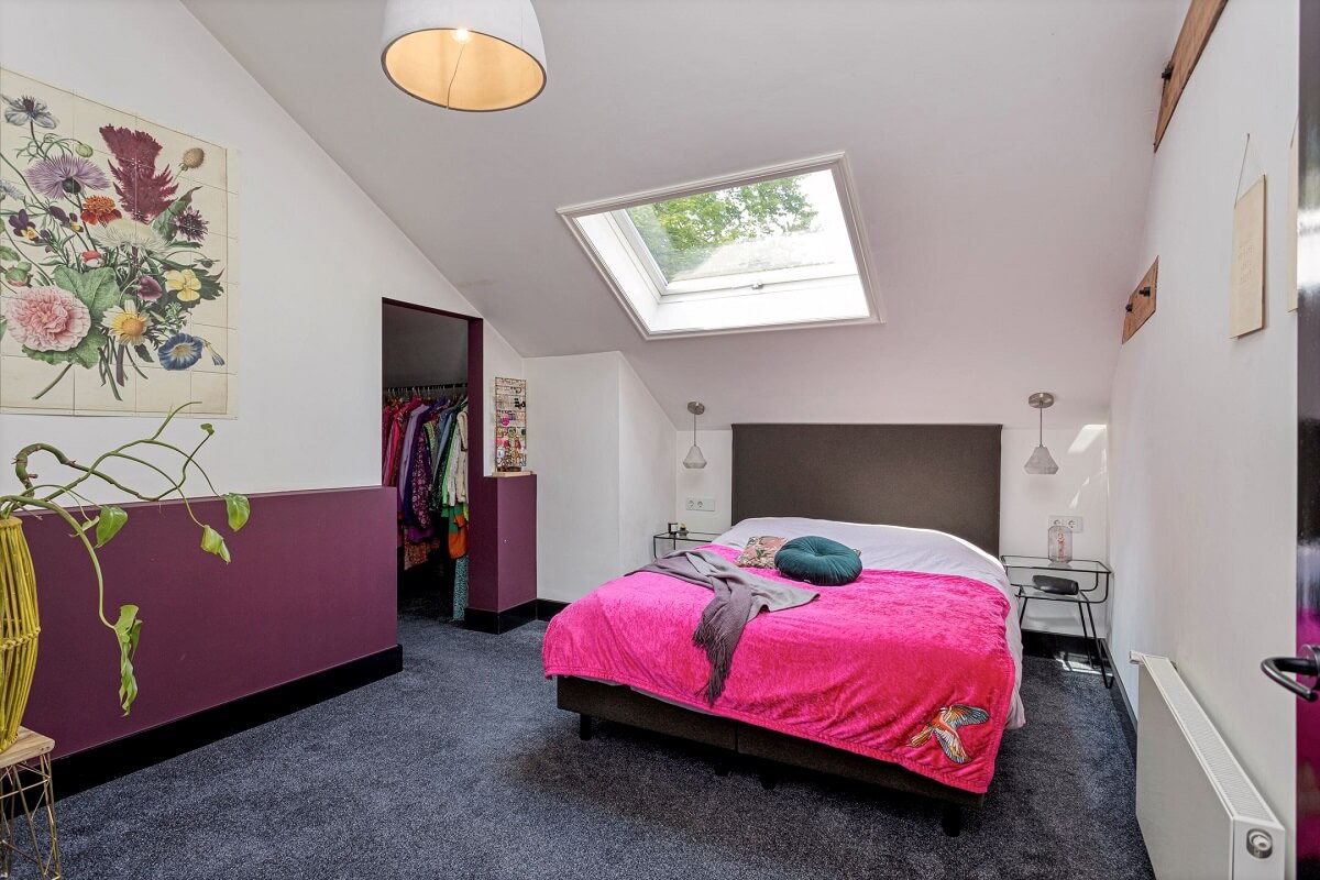 attic-bedroom-skylight-purple-half-painted-wall-walk-in-closet-nordroom
