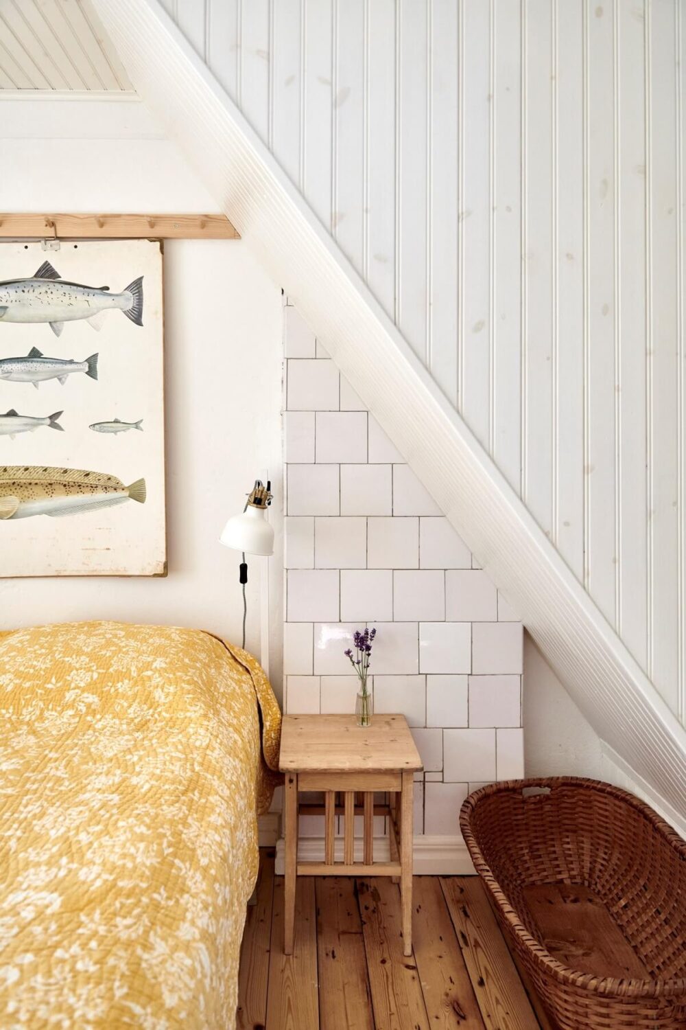 attic-bedroom-wooden-floor-slanted-ceiling-nordroom