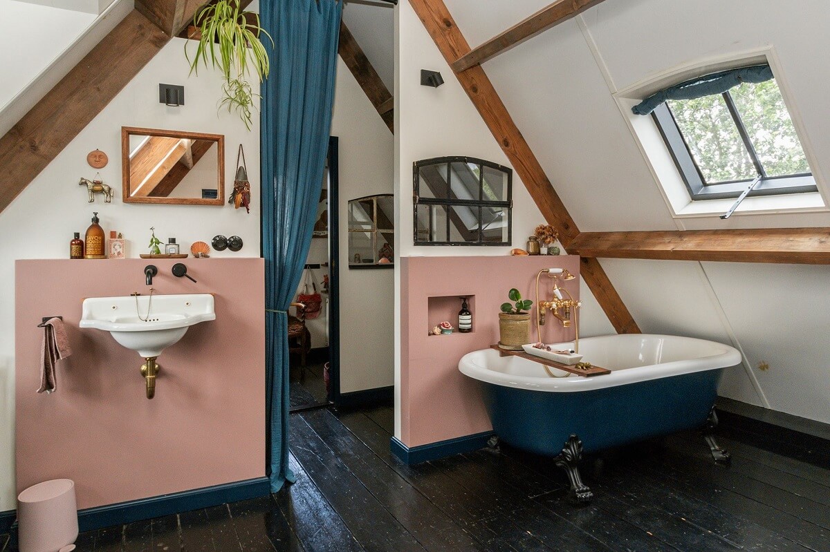 bahtroom-pink-half-painted-wall-blue-freestanding-bath-slanted-ceilings-nordroom
