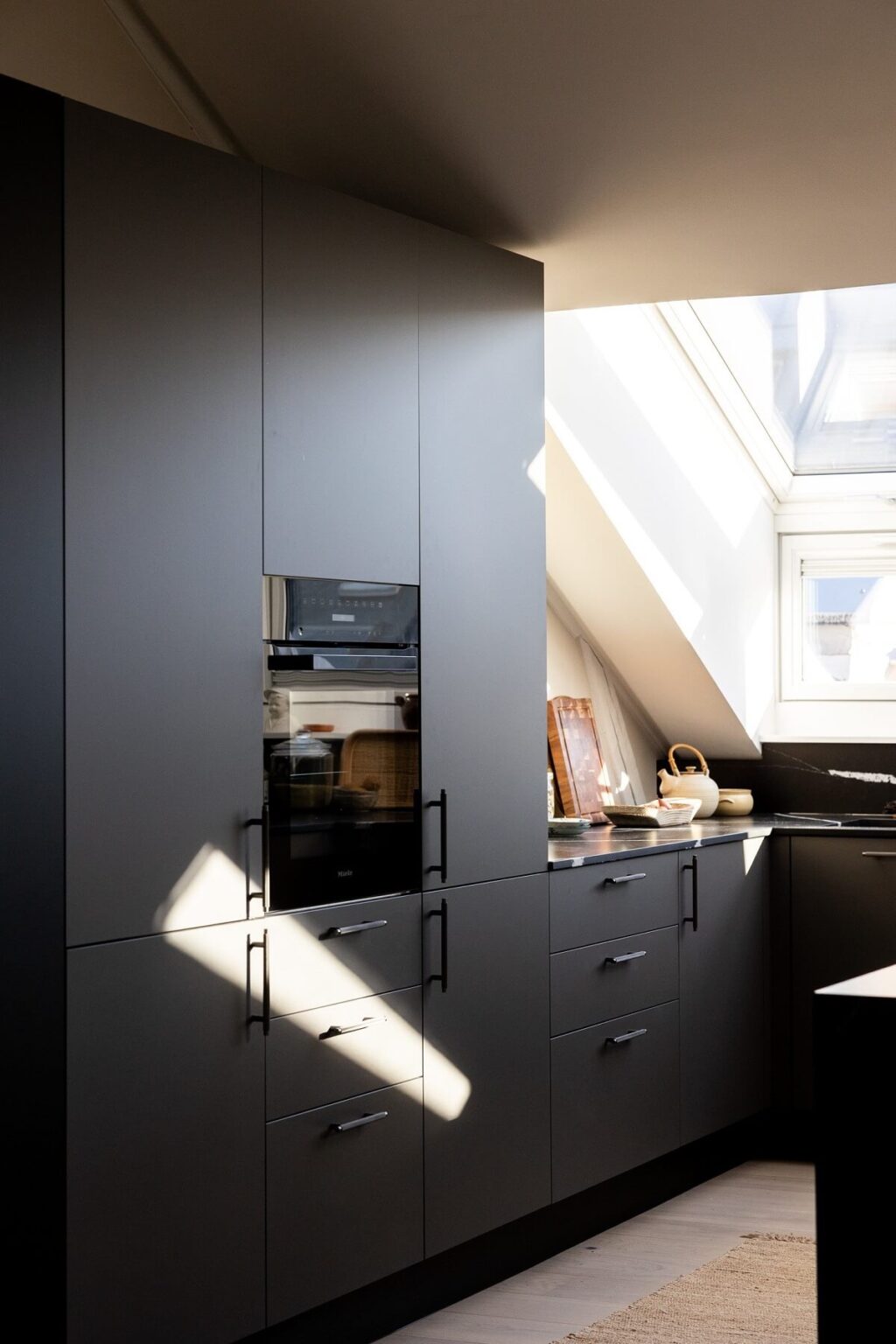 View of A Black & White Penthouse Apartment Full of Curves