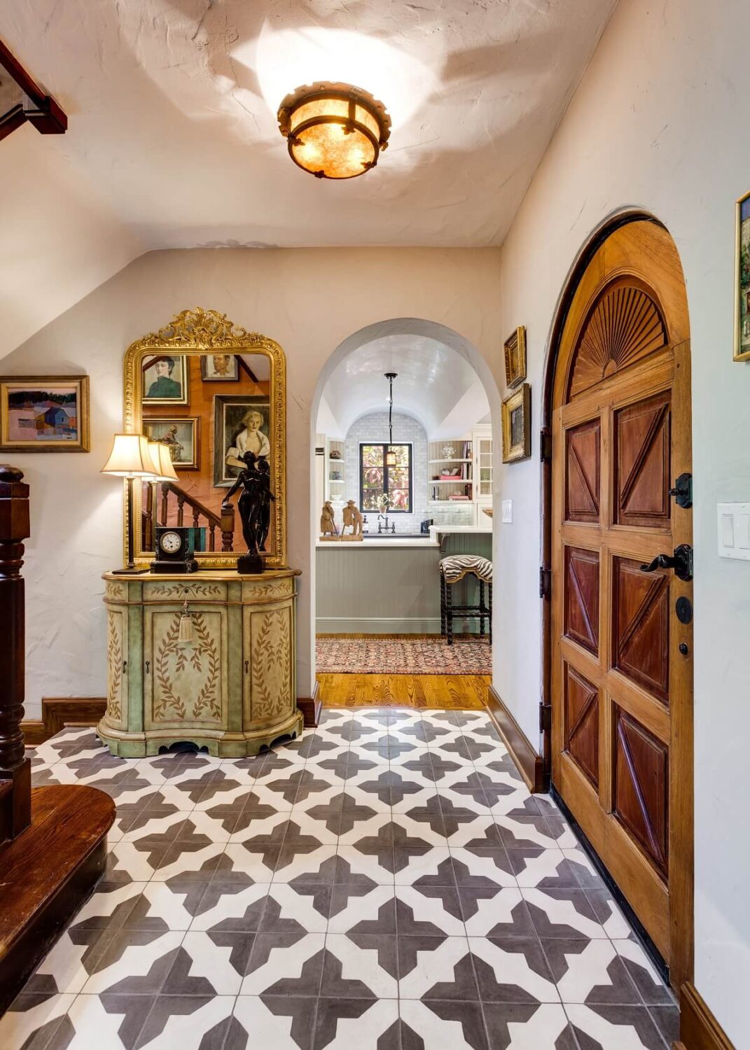 black-white-floor-tiles-rustic-wooden-front-door-nordroom