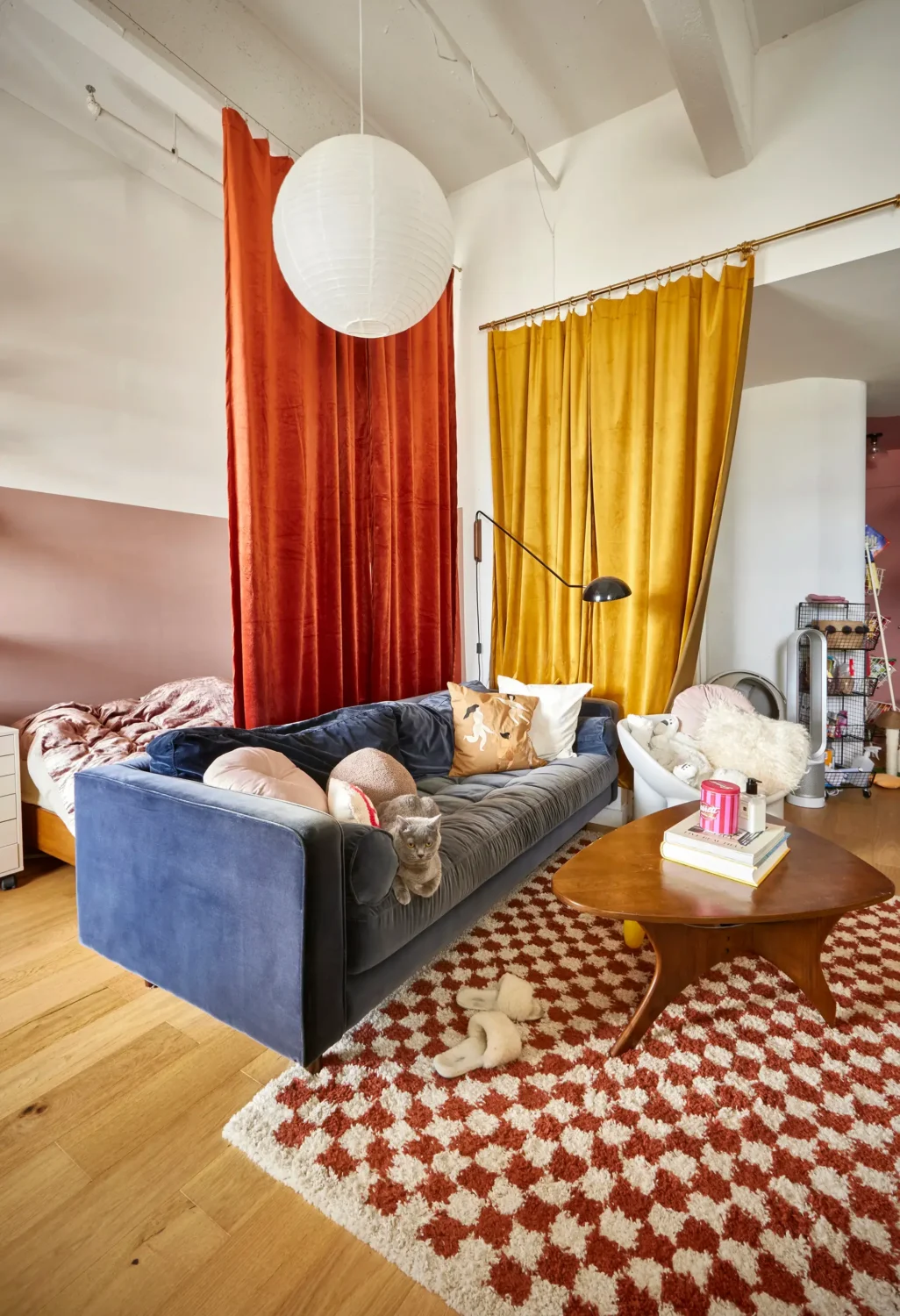 colorful-studio-apartment-orange-yellow-curtains-nordroom