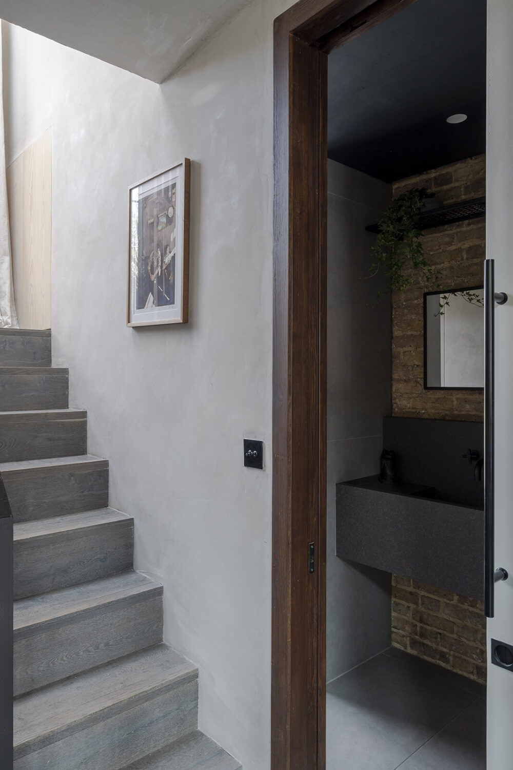 modern-concrete-staircase-powder-room-nordroom