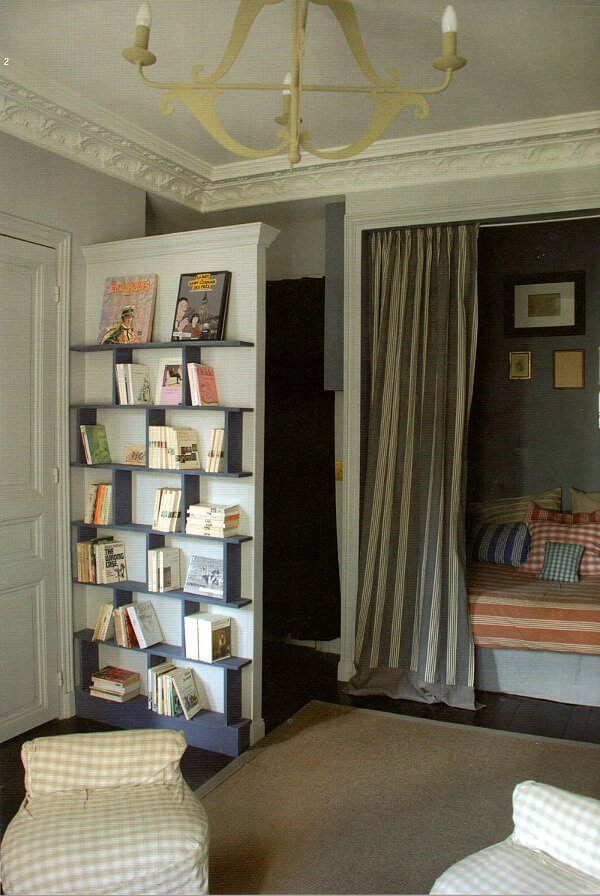 paris-studio-apartment-curtain-bookshelves-room-divider-nordroom