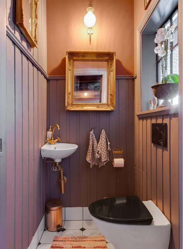 pink-powder-room-antique-mirror-nordroom