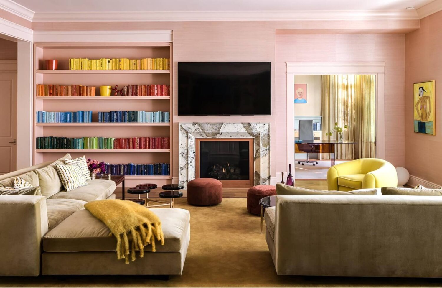 pink-television-room-color-coded-bookshelves-nordroom