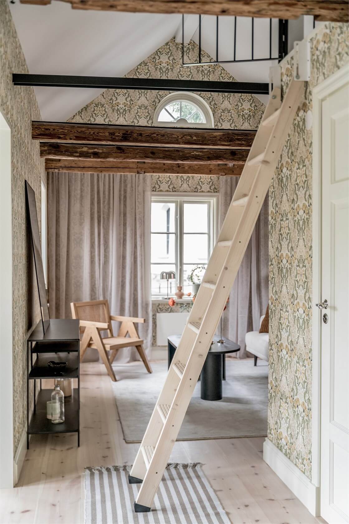 An Idyllic Small Swedish House with Wooden Beams