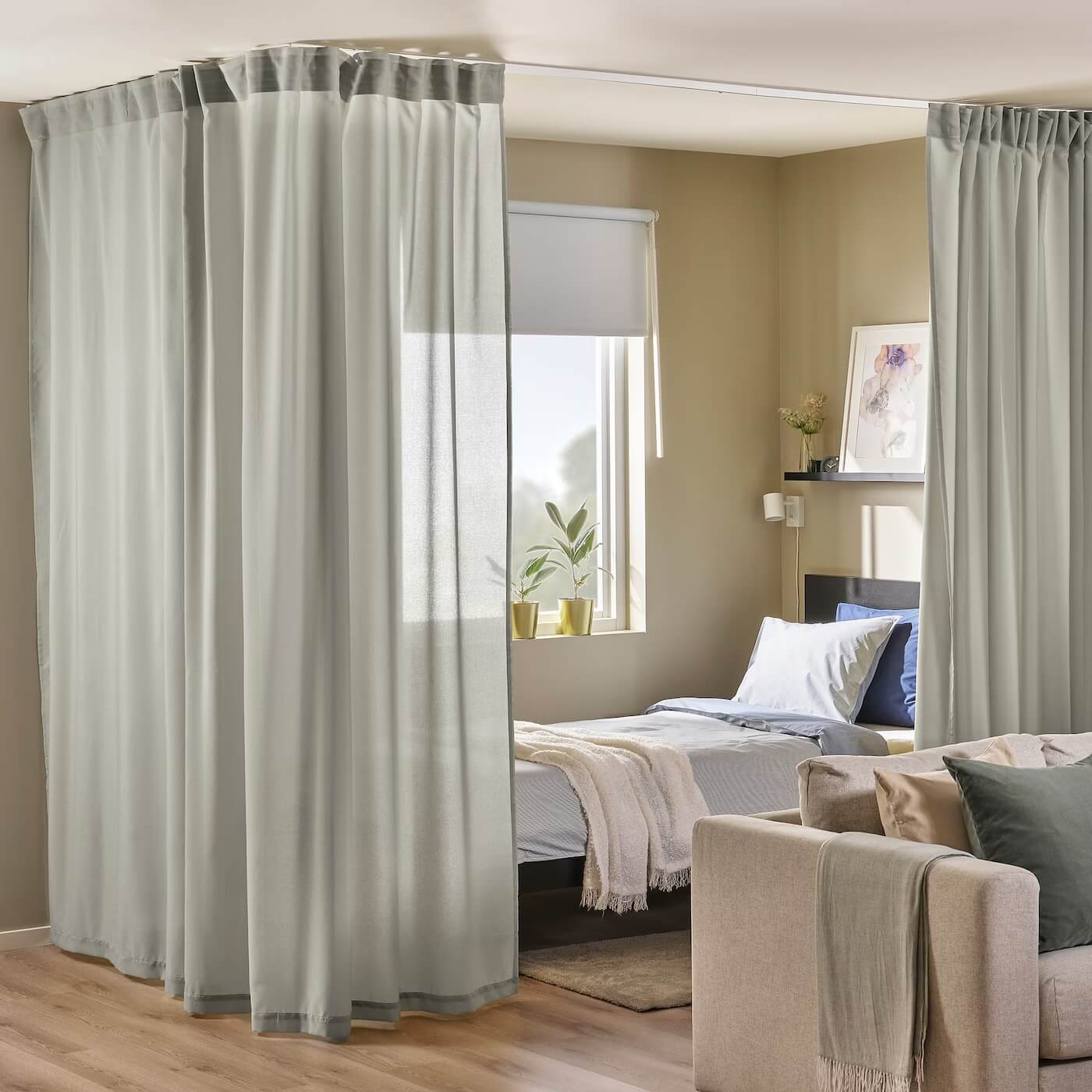 studio-apartment-sheer-curtains-around-the-bed-ikea-nordroom