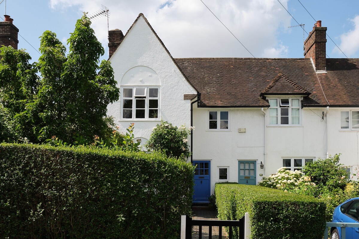 white-english-cottage-blue-front-door-nordroom