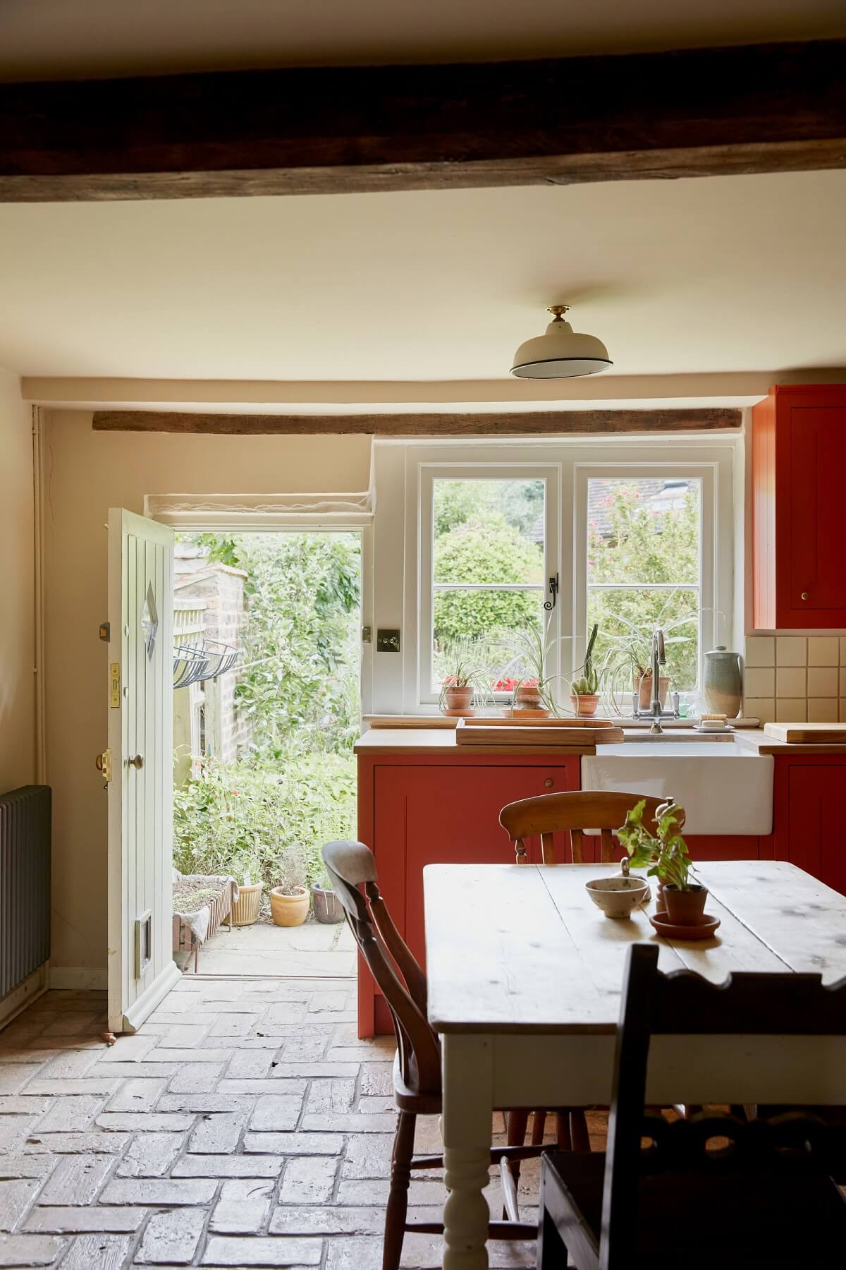 An English Cottage with a Coral Pink Kitchen