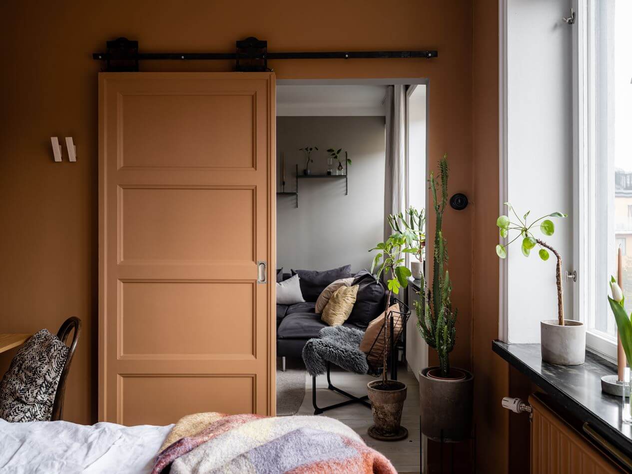 earthy-terracotta-wall-color-bedroom-nordroom