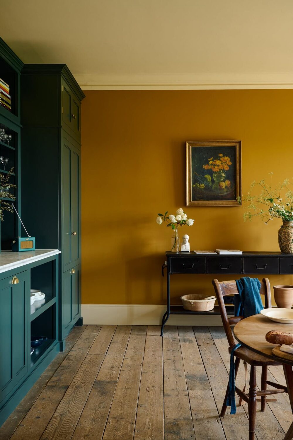 golden-yellow-wall-blue-kitchen-cabinets-nordroom