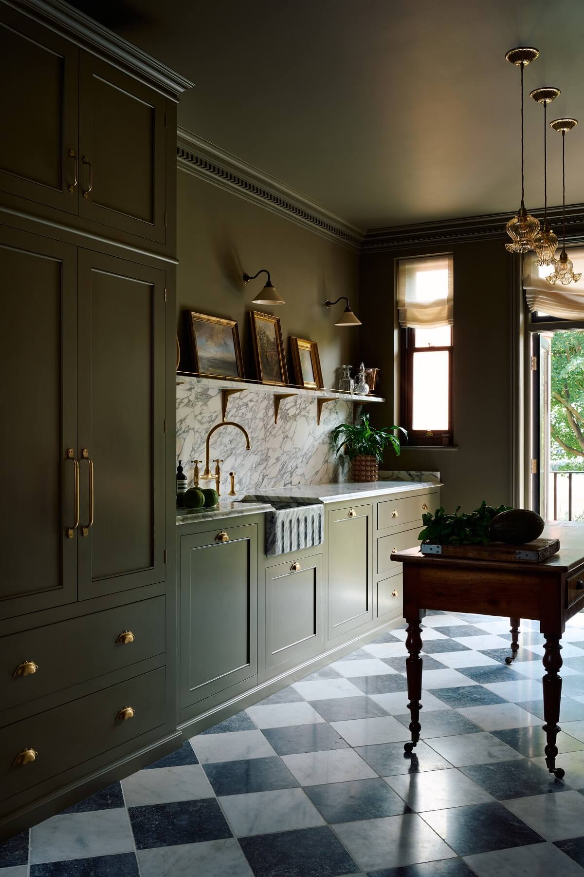 An All-Green deVOL Kitchen with A Marble Checkerboard Floor
