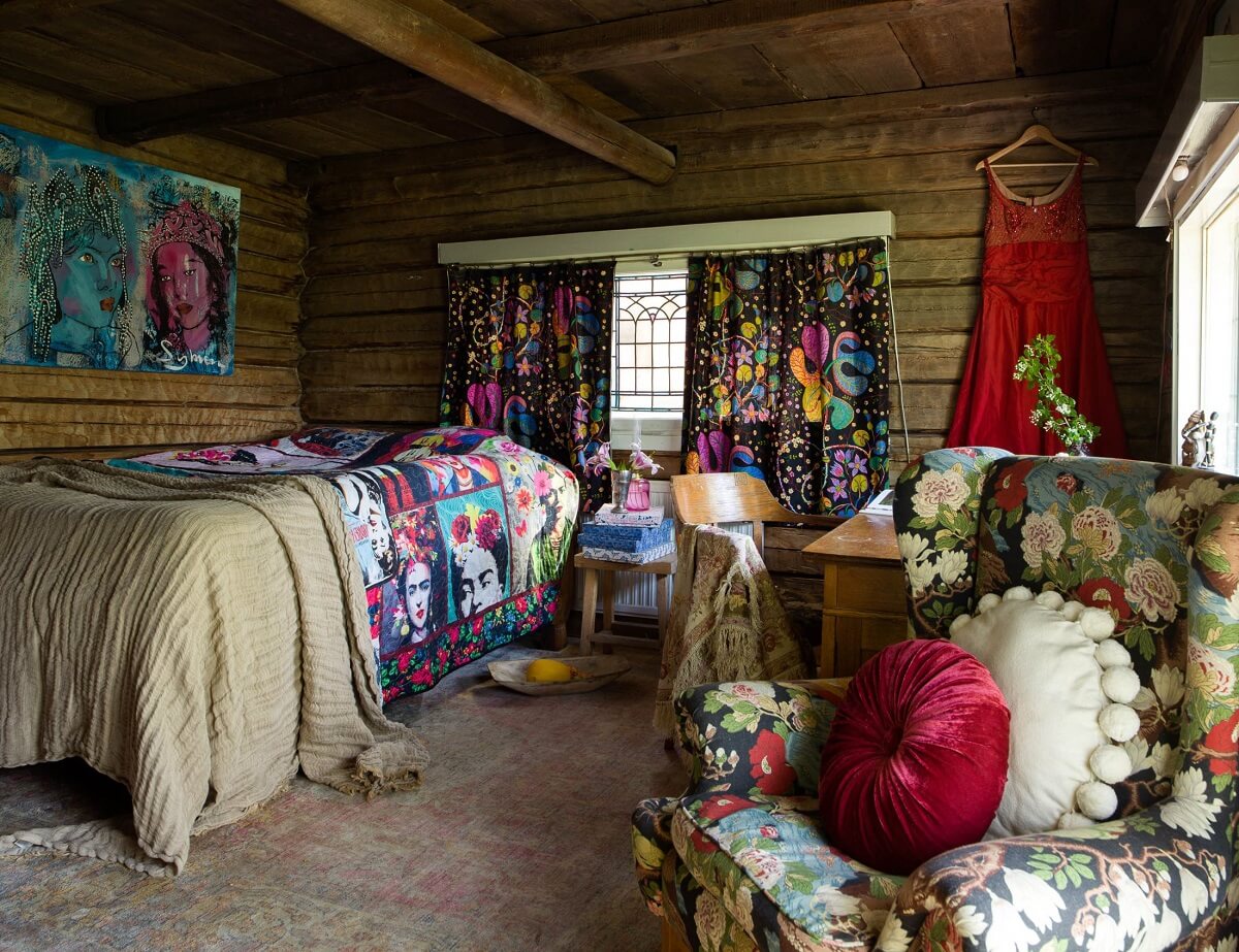 A Rustic Log Cabin With A Green Bathroom