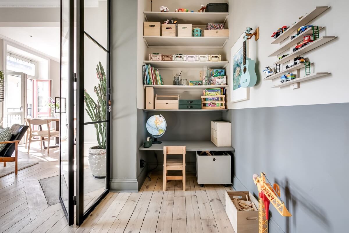 small-childrens-room-half-painted-wall-desk-shelves-nordroom