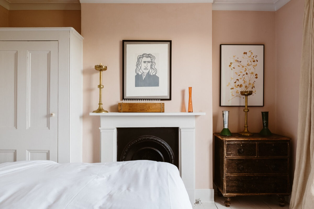 bedroom-light-pink-walls-fireplace-nordroom