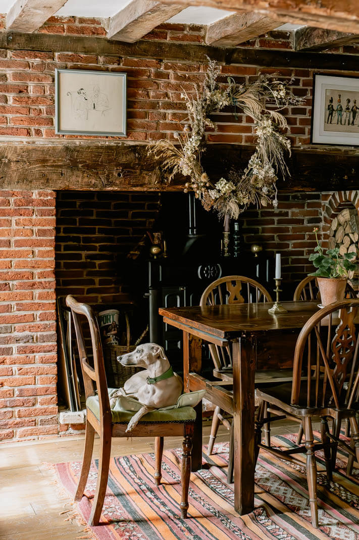 dining-room-exposed-brick-walls-fireplace-nordroom