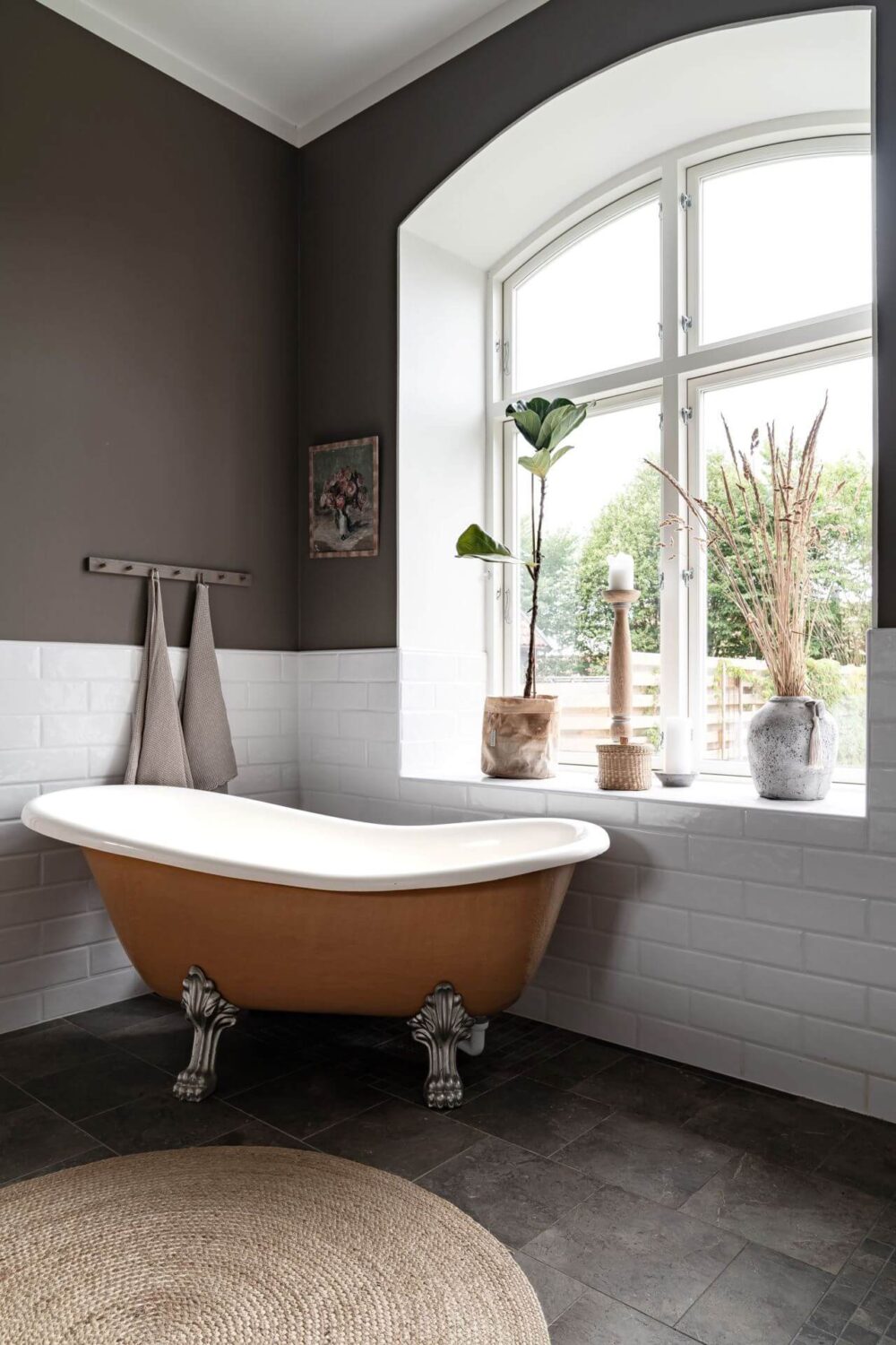 freestanding bath gray walls nordroom A Former Swedish School is Now a Beautiful Home