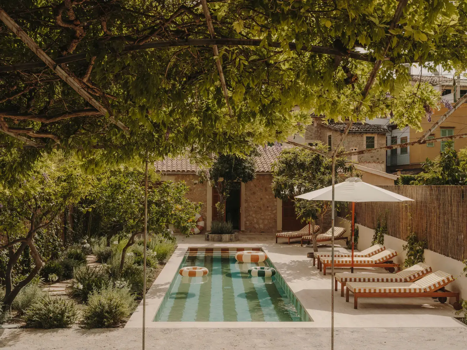 A Historic Townhouse on Majorca with a Striped Pool