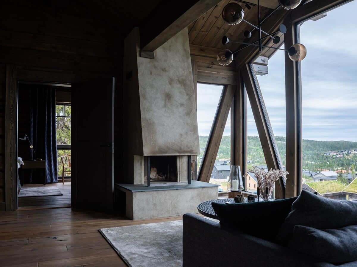 living-room-fireplace-floor-to-ceiling-windows-log-house-nordroom