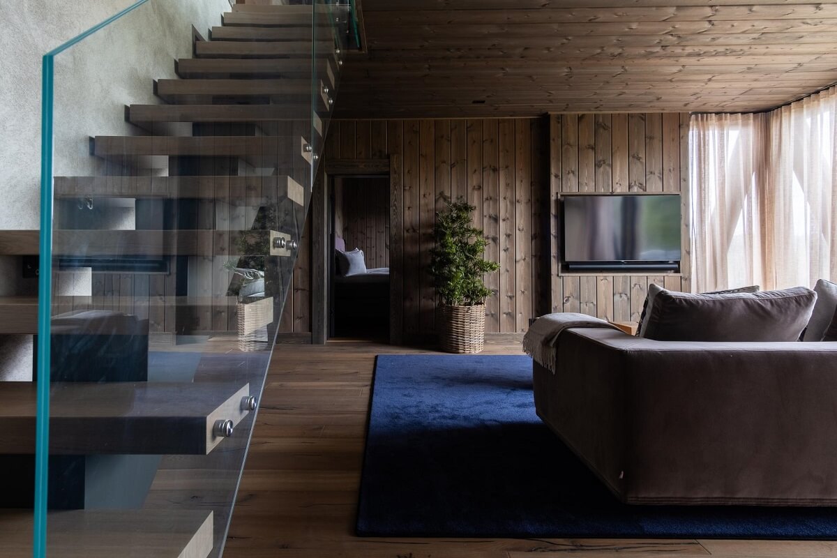 log-house-living-room-blue-rug-nordroom