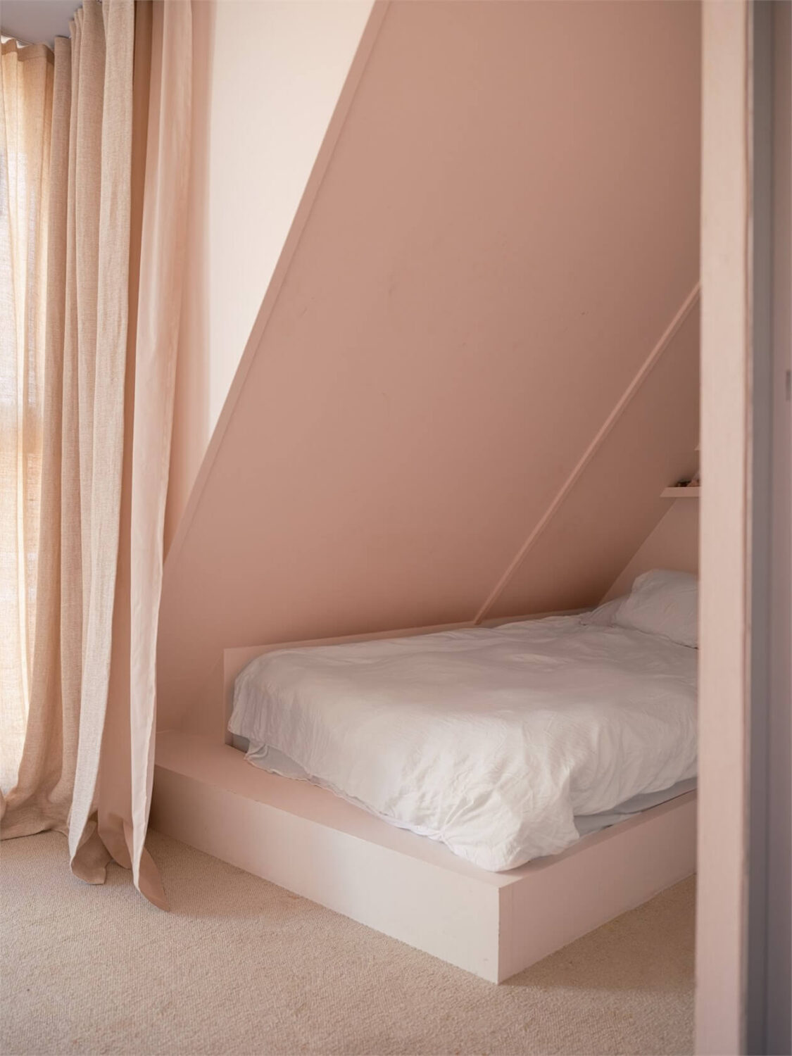 small-light-pink-bedroom-slanted-ceiling-nordroom