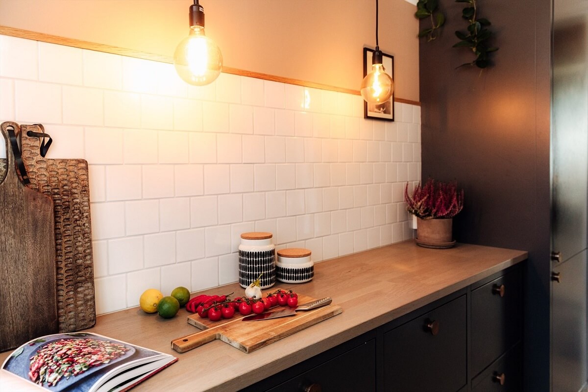black-kitchen-wooden-worktop-white-tiles