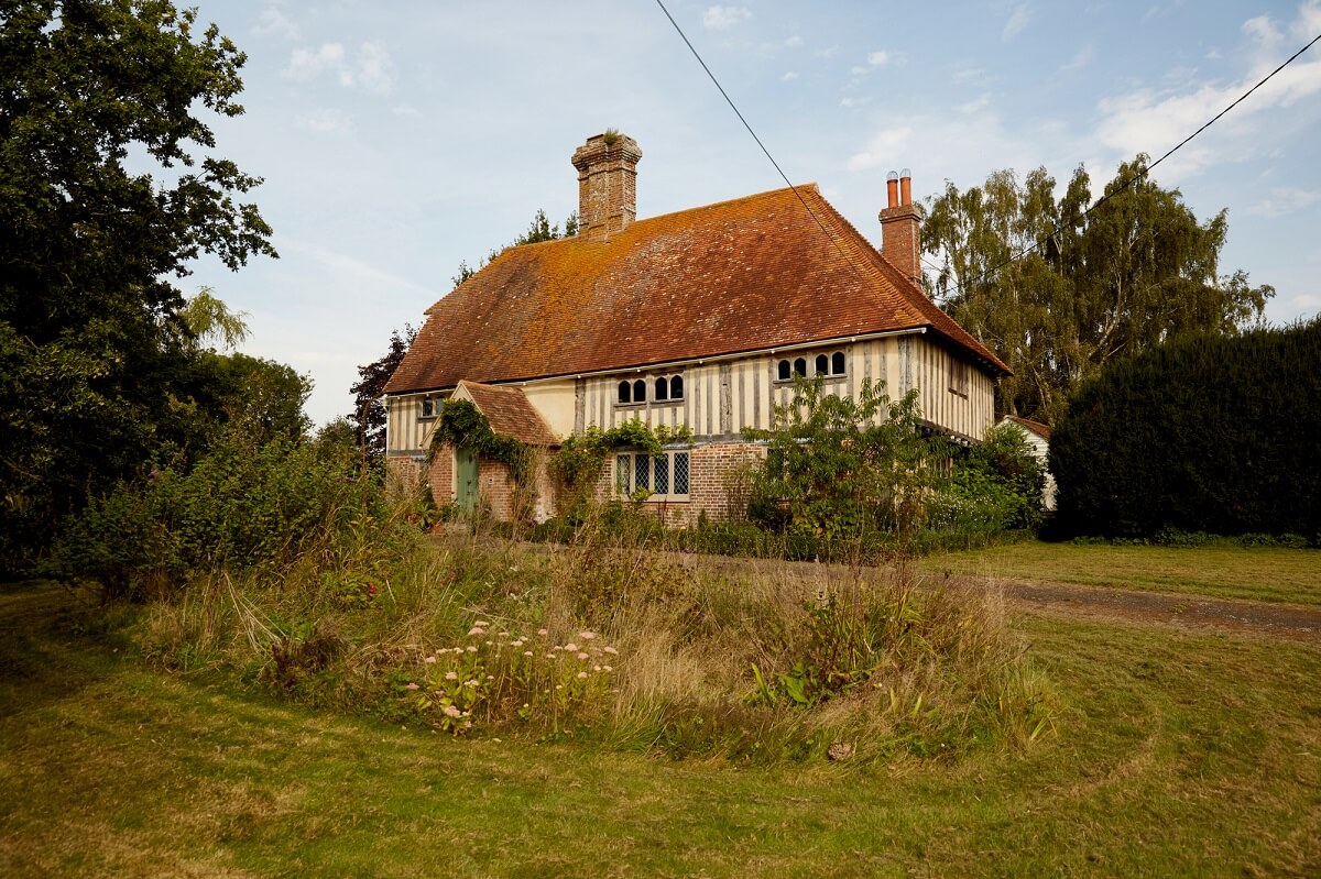 A Charming Historic Farmhouse with a Bright Yellow Kitchen