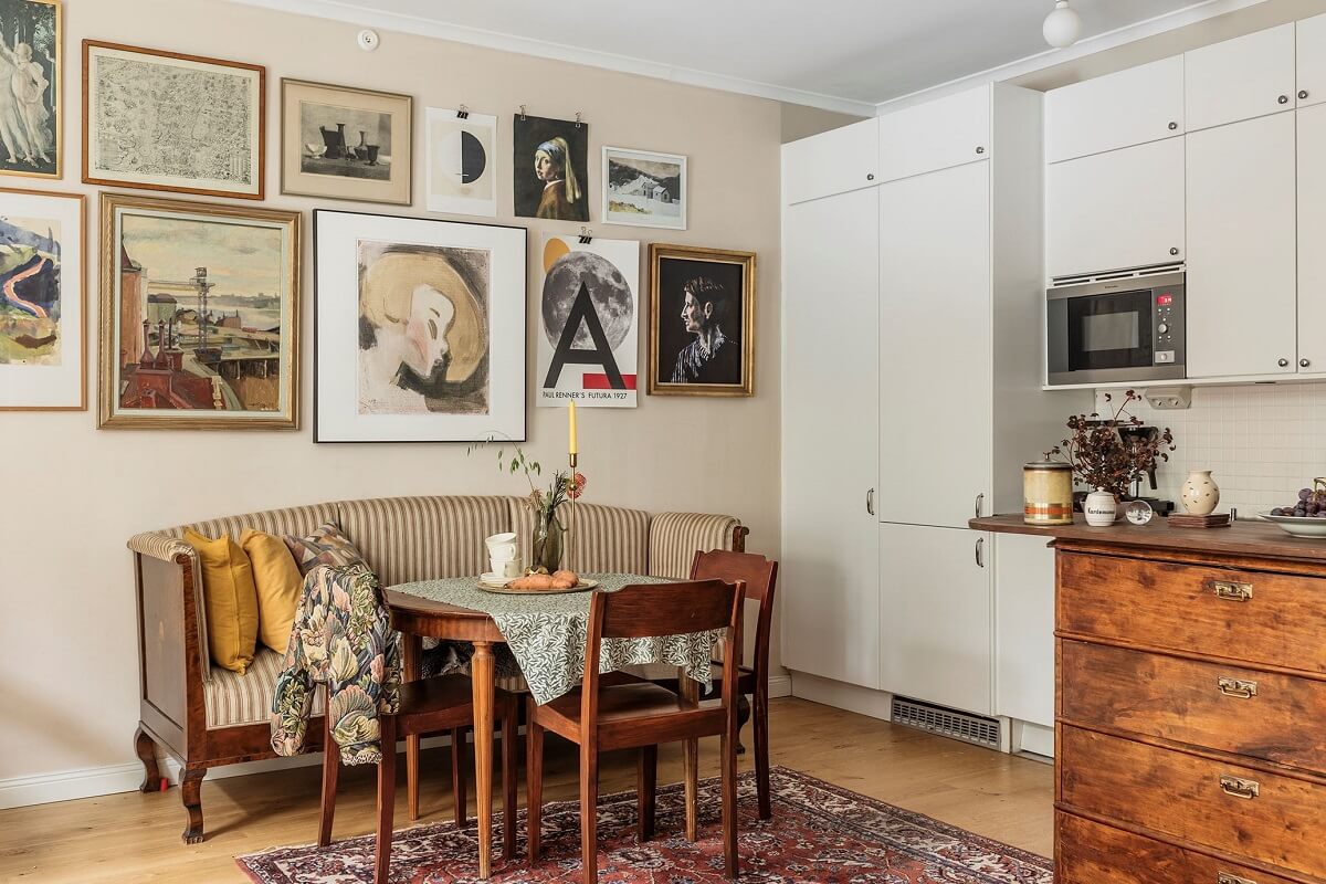 kitchen-dining-space-vintage-bench-gallery-wall-nordroom
