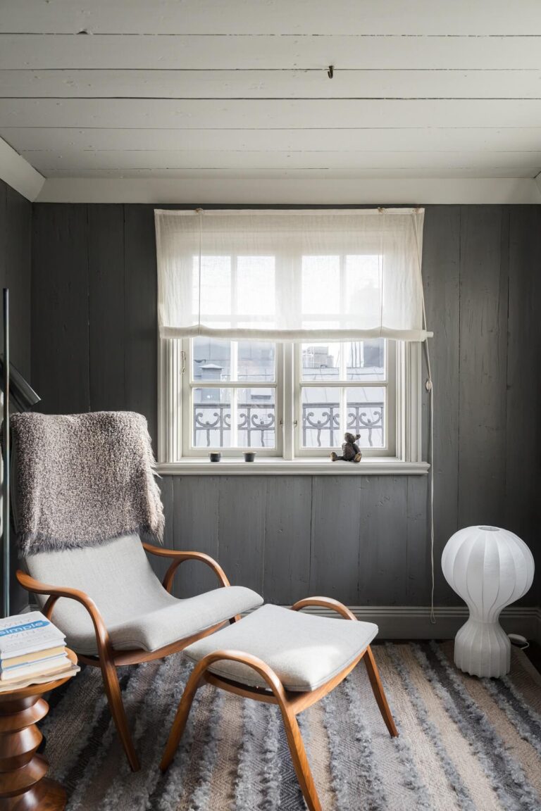View of A Scandinavian Penthouse Apartment with Slanted Ceilings