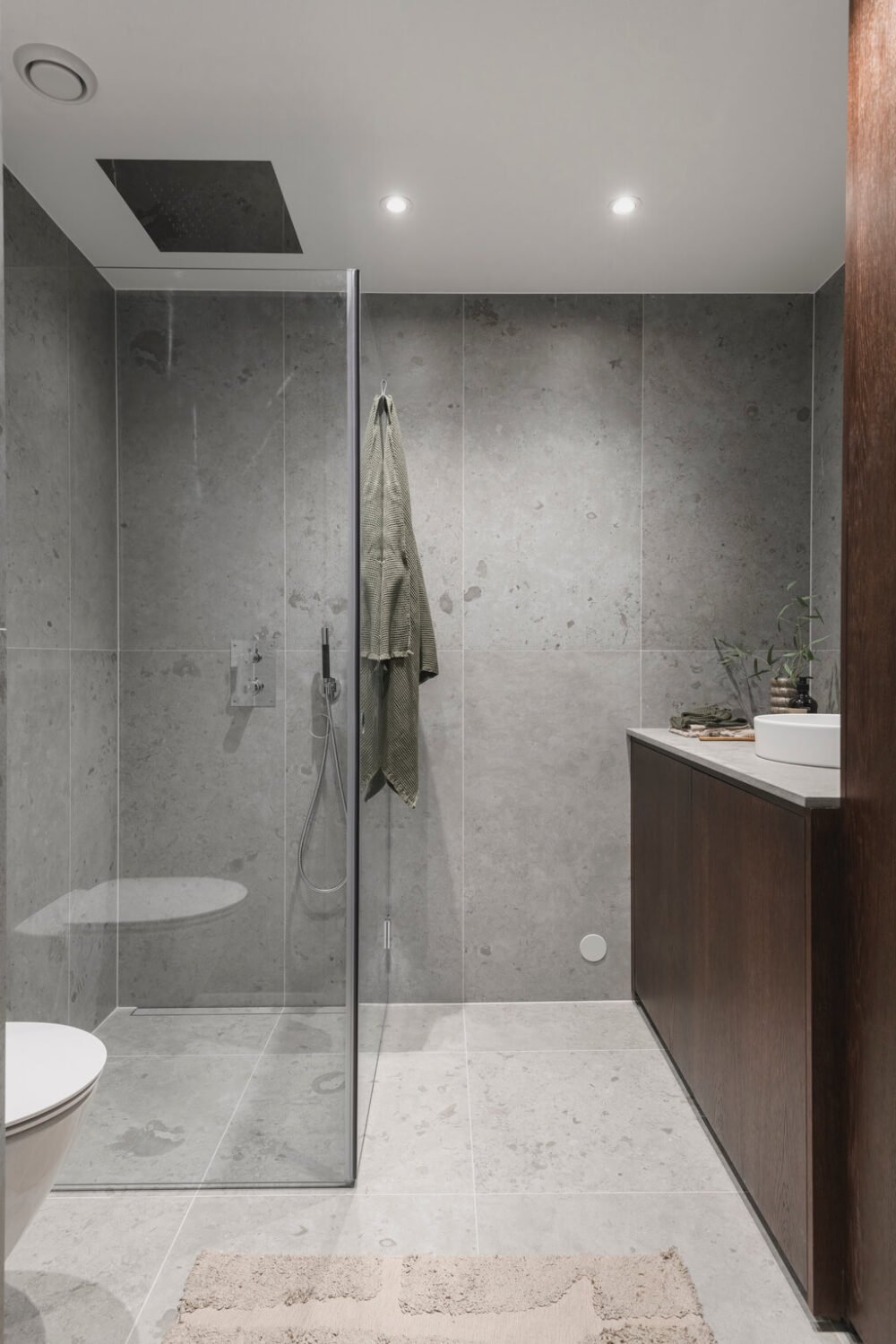 modern-scandinavian-bedroom-gray-tiles-wooden-vanity-nordroom