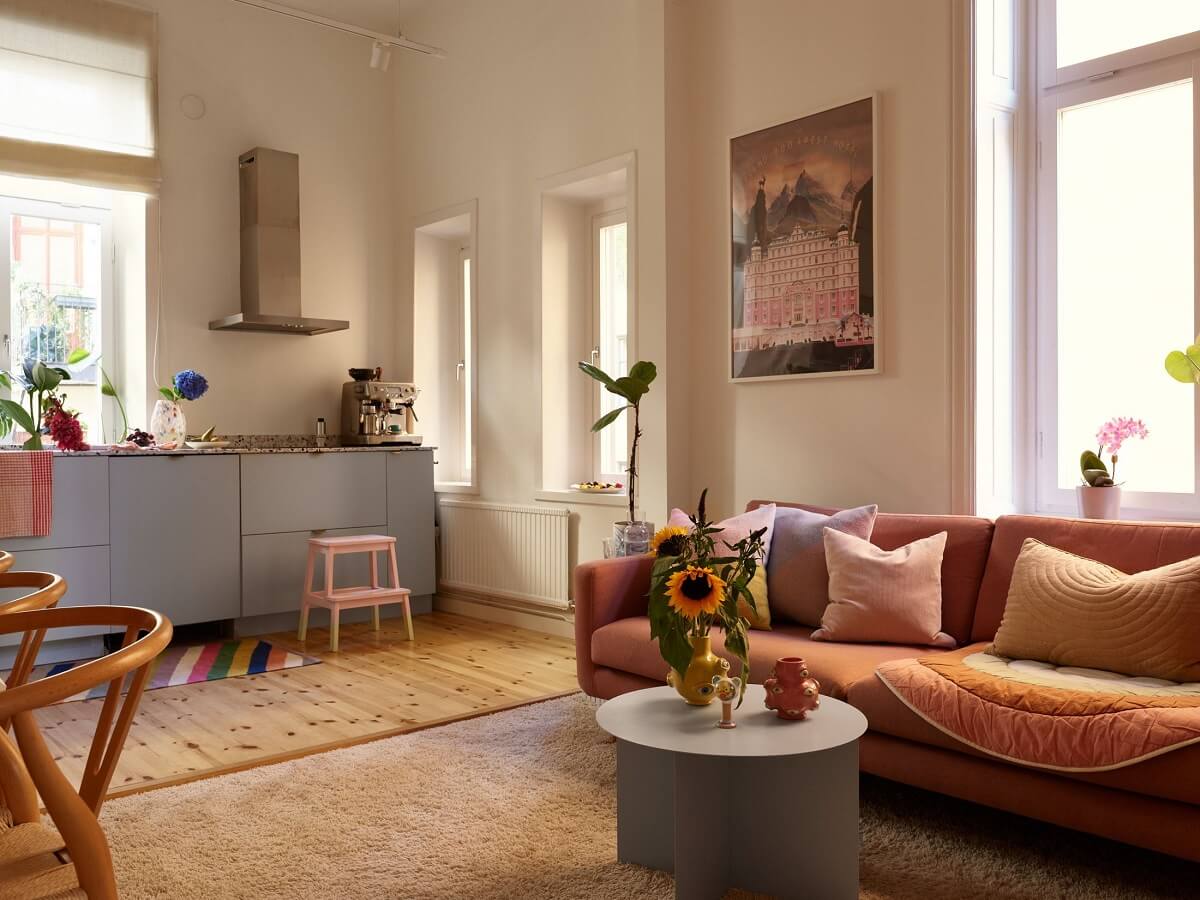 open-plan-living-room-kitchen-pink-sofa-nordroom