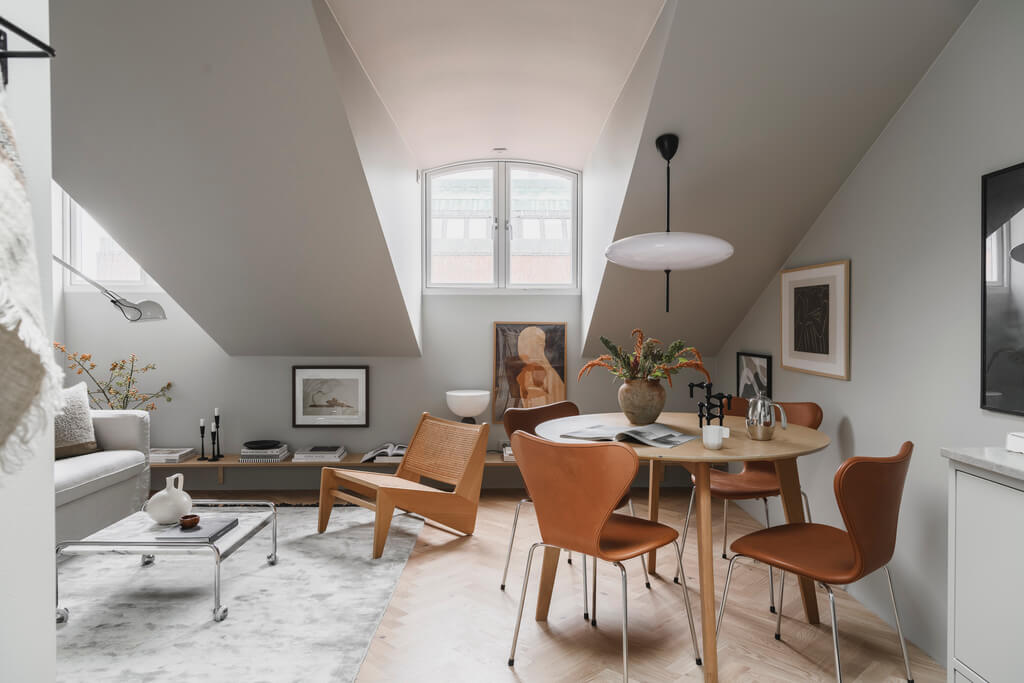 white-scandinavian-living-room-slanted-ceiling-nordroom