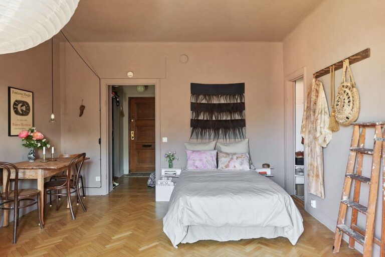 View of A Scandinavian Studio Apartment with Pink Walls - The Nordroom