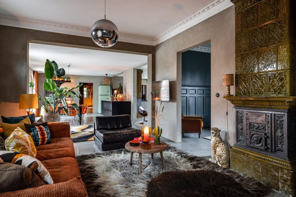 cozy-living-room-burnt-orange-sofa-green-fireplace-nordroom