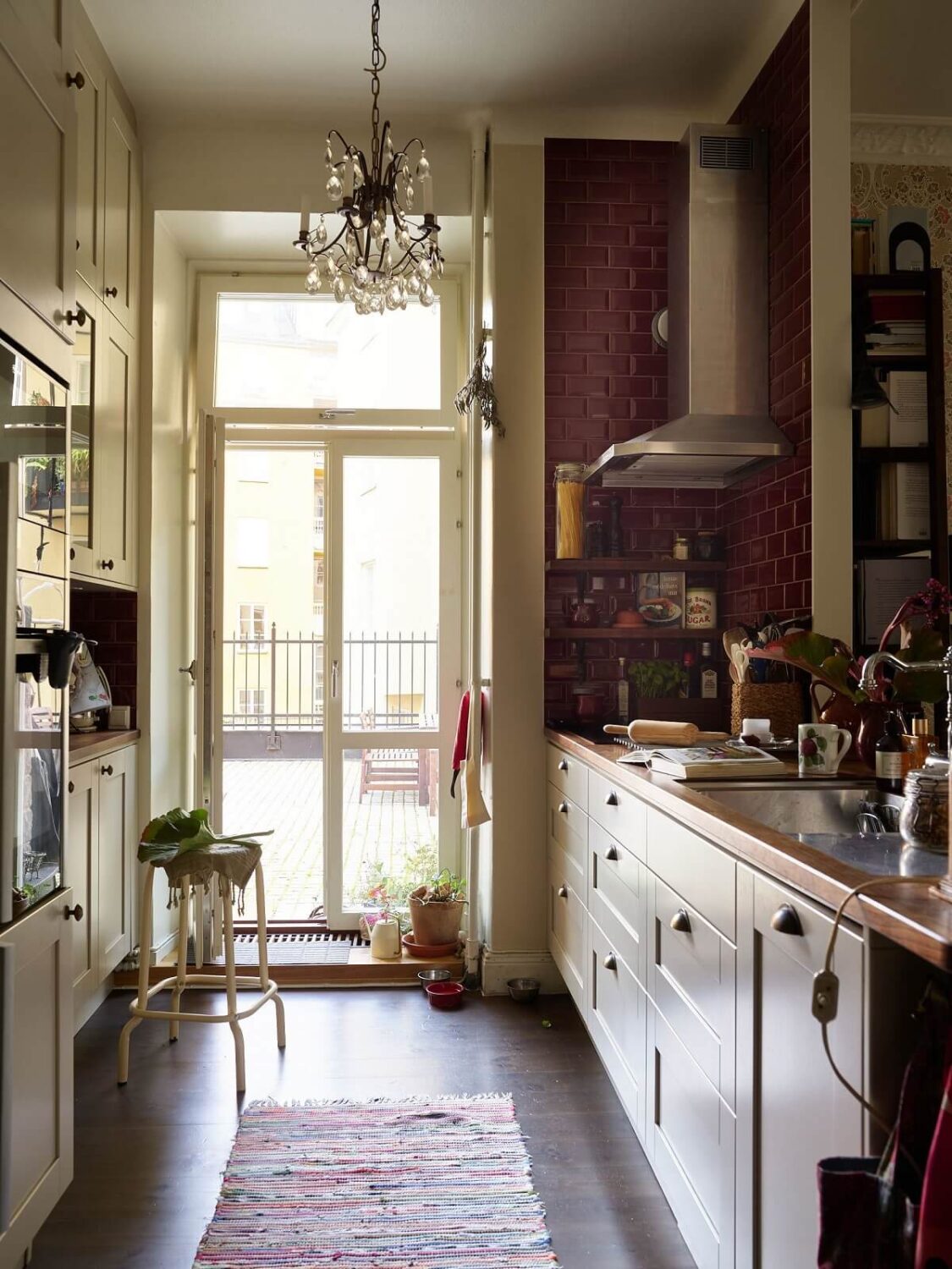 kitchen-white-cabinets-red-tiles-nordroom