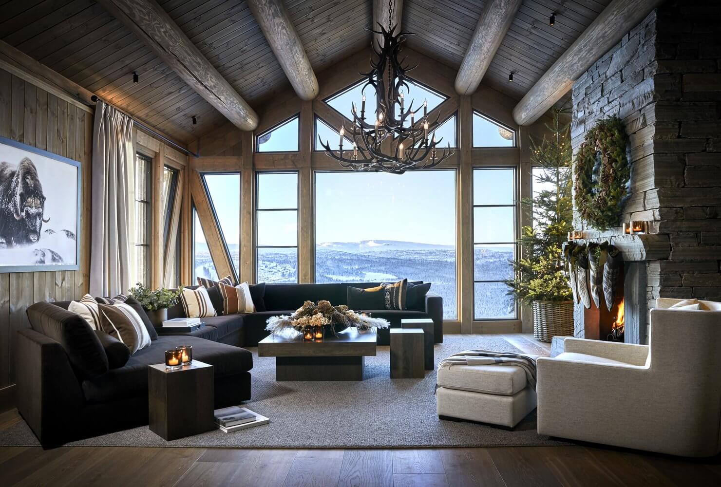 norwegian log home living room pitched ceiling christmas decor stone fireplace nordroom