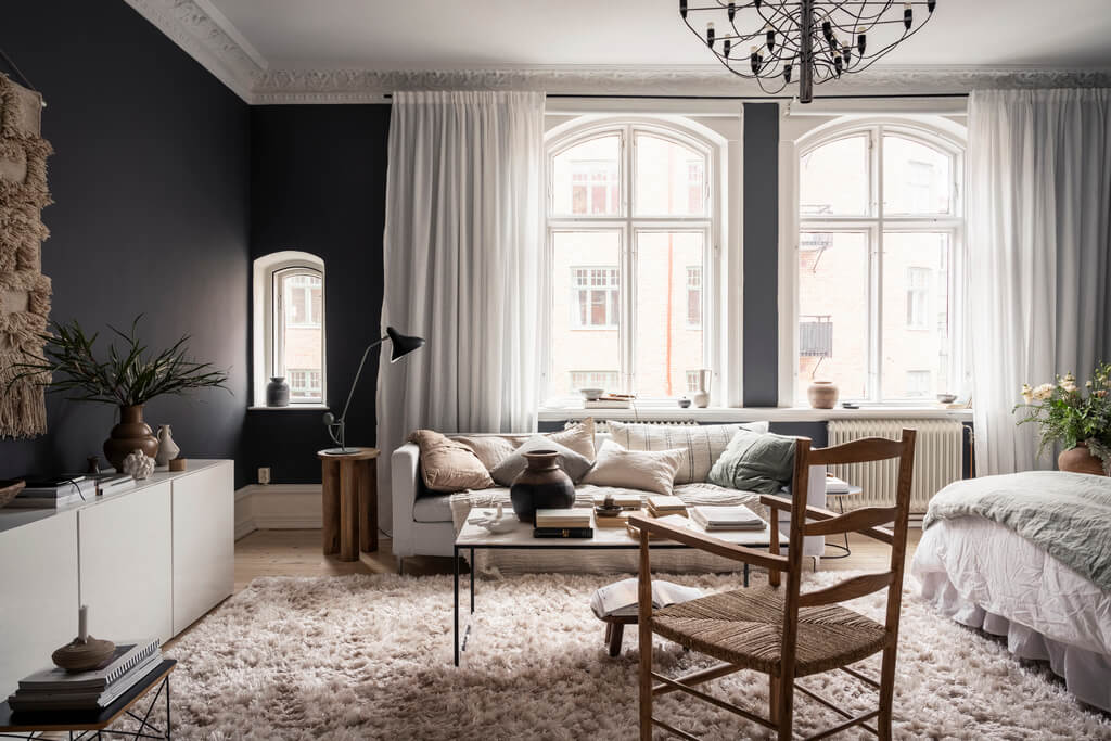 A Scandinavian Studio Apartment with Black Walls