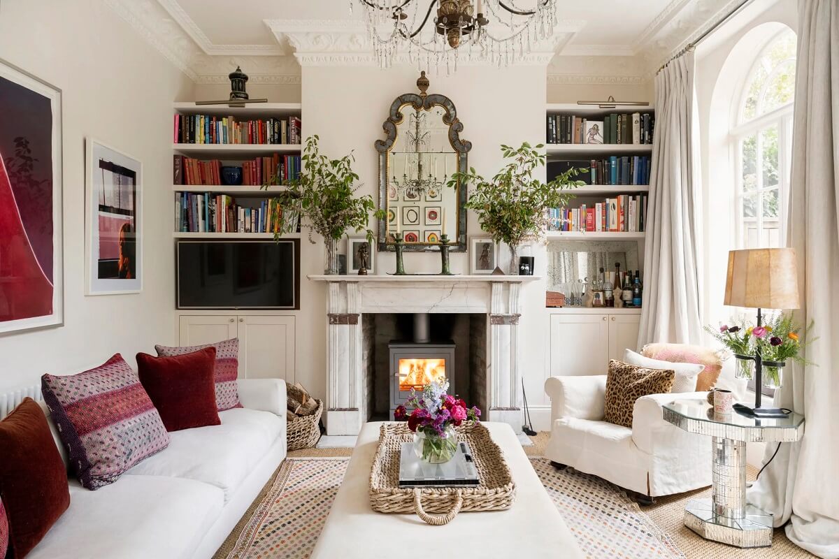 white living room arched windows fireplace bookshelf niches nordroom