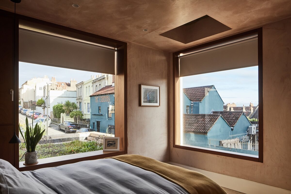 bedroom-two-large-windows-street-view-nordroom
