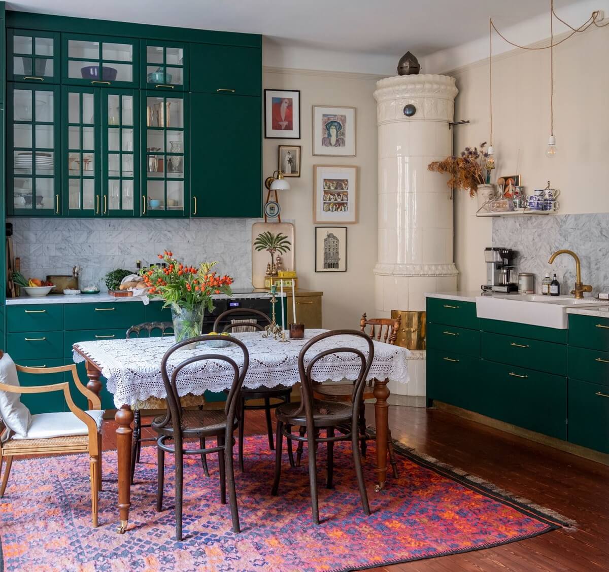 green kitchen with dining table kakelgn mahogany floorboards nordroom